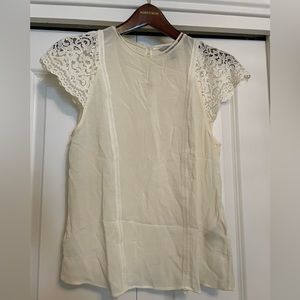 Cream lace-sleeved blouse